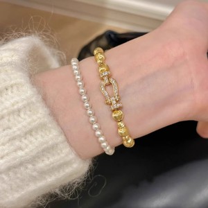 Bracciale Trendy con Fibbia a Ferro di Cavallo Effetto Occhio di Gatto Dorato, Bracciale Elastico Vintage di Alta Gamma per Feste - Product Image 3