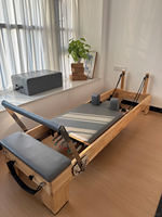 Reformer de Pilates professionnel en bois de chêne - Équipement d'entraînement portable et réglable pour la maison, idéal pour le yoga et le fitness