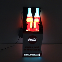 Bouchon double face lumineux pour étagère installée sur étagère au supermarché avec lumière constante ou effet flash automatique.