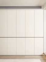 Armoire Cloud White Écologique Grande Capacité avec Portes Segmentées Sans Cadre et Poignées Intégrées pour Maison Moderne