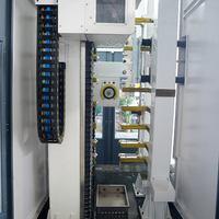 Machine CNC verticale pour verre avec logiciel CAM auto-développé, changement d'outil automatique, broche à refroidissement par eau, perçage, fraisage, chanfreinage