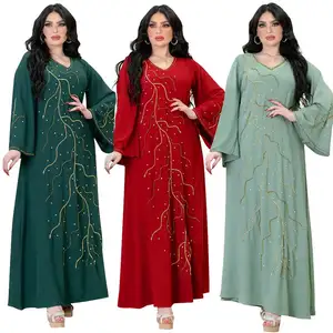 थोक शीतकालीन अबाया महिला मुस्लिम पोशाक शीतकालीन 2024 के लिए गोल्ड शाइनिंग पाउडर के साथ दुबई पोशाक