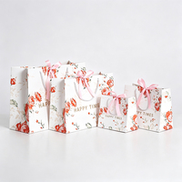 Sac cadeau écologique en papier à motif floral rose, avec logo personnalisé, ruban, nœud et poignée imprimée or, pour dragées de mariage, vente en gros