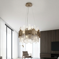 Luminaire Jingshi à anneau lumineux doré avec tubes en verre, panneaux texturés densément disposés en cercle, éclairage d'ambiance chaleureux pour la maison
