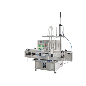 Machines de remplissage automatiques à 4 têtes pour sauce chili, pâte, shampoing, savon, bouteilles en plastique, jus d'orange, miel, parfum - Product Image 1