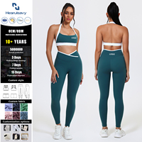 Ensemble de sport 2 pièces pour femme en Spandex/Nylon, comprenant un soutien-gorge de sport dos nu color-block et un legging sculptant taille haute à imprimé aquatique