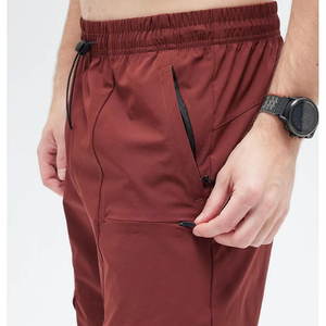 Shorts Bermuda pour hommes, couleur unie, séchage rapide, avec taille élastique et plusieurs poches, vêtements décontractés pour l'extérieur - Product Image 1