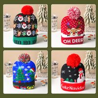 Decorazione della festa di natale ha portato i berretti di Babbo Natale con luce calda lavorata a maglia cappellino per adulti cappelli natalizi con luce a Led