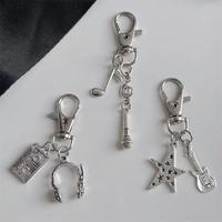 Porte-clés et breloques en métal, thème rock, guitare, étoile, casque audio, pour étuis d'écouteurs, sacs et accessoires, vente en gros