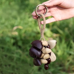 Wholesale Handcrafted Natural Fruit Shell Bag Charm Boho Seed Pod Mini <b>Wind</b> <b>Chime</b> For Gift And Bag Decoration - Product Image 1