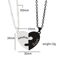 Collier tendance en acier inoxydable noir et blanc avec pendentif en forme de cœur et lettre anglaise