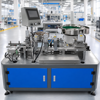 Machine automatique d'insertion de noyaux de valve pour l'assemblage des valves d'extincteurs