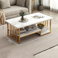 Table d'appoint de style avec plateau en verre et pieds en métal pour salon