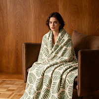 Plaid en polaire à imprimé feuilles, base crème, motif botanique en forme d'éventail, doux et confortable, pour canapé et lit, vente en gros