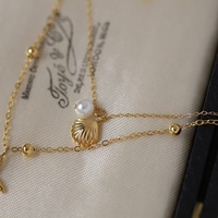 À la mode nouveau été femmes mode bijoux accessoires cadeaux perle étoile de mer coquille pendentif en acier inoxydable Double 2 couches collier