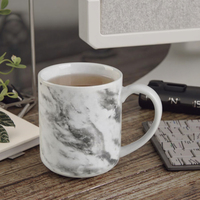 2025 nouvelle tasse en céramique marbre Design personnalisé tasse en porcelaine tasses 11oz blanc noir tasse à café en céramique pour un usage quotidien
