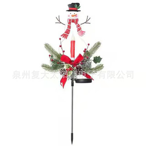 Décoration de jardin solaire de Noël en forme de bonhomme de neige avec bougie et pomme de pin, résistante à l'eau, pour extérieur - Product Image 1