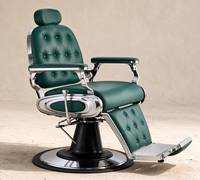 Fauteuil de coiffure hydraulique à boutons capitonnés verts pour hommes, idéal pour les salons de coiffure