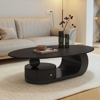 Table basse créative de style crème, ovale, pour salon, petite unité domestique, style italien minimaliste avec rangement