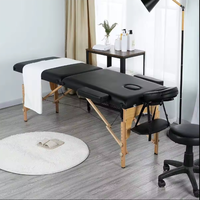 Lit de massage pliable et portable pour salon de beauté, style moderne, réglable, en bois, pour thérapie faciale et cils, haute densité, idéal pour hôtels - Vente chaude