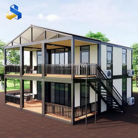 Maison conteneur préfabriquée extensible en acier de 40 pieds avec panneaux sandwich isolés thermiquement et étanches pour usage résidentiel/bureau/boutique