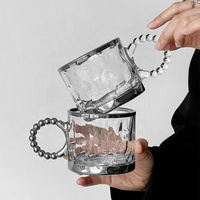 Offres Spéciales créatif résistant à la chaleur eau bière lait sans tige verre lumière luxe affaires Style noir tasse à café avec poignée en perle