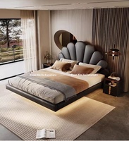 2024 lit flottant minimaliste italien en cuir véritable Double couche supérieure pétale de peau de vache cadre en bois moderne pour chambre principale