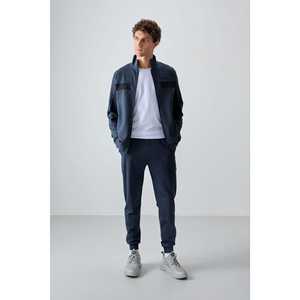 Ensemble de survêtement indigo pour homme Fila, coupe standard, pantalon de jogging décontracté respirant et sweat à capuche zippé pour adultes - Product Image 1