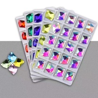 Nouveauté 2026 – Strass en verre à deux trous à coudre, multicolores, à facettes, pierres de cristal à coudre à la main pour la décoration de vêtements (ODM)