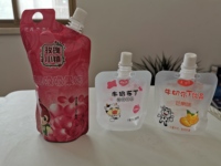 Machine de remplissage et de bouchage de sacs debout à double tête à grande vitesse avancée, remplissage quantitatif automatique