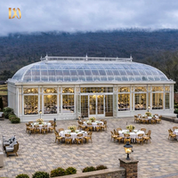 Orangerie en fer forgé de style victorien avec verrière, grand pavillon extérieur pour mariages, serre