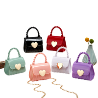 2025 Mini fille sacs à main à chaîne unique sac à bandoulière bonbons PVC gelée enfants messager pour les filles