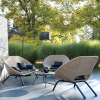 Canapé paresseux en rotin extérieur haut de gamme terrasse de café canapé simple avec table basse