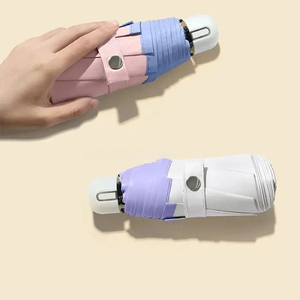 Paraguas de viaje plegable 8 costillas Mini bolsillo compacto lluvia sol paraguas a prueba de viento a prueba de lluvia con cápsula para la vida diaria UPF 50 - Product Image 4