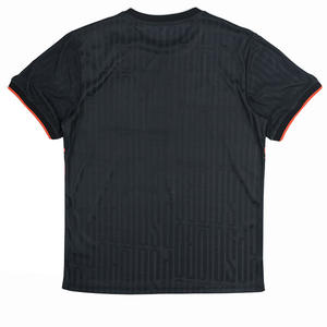 Uniforme de football personnalisé noir et orange à motif délavé, respirant, léger, à manches courtes, avec un design graphique audacieux - Product Image 2
