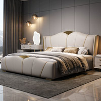 Lit double moderne en similicuir avec espace de rangement rembourré, style minimaliste, design de chambre principale, lit principal