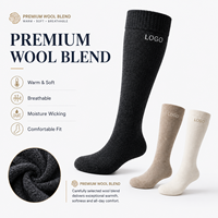 Chaussettes hautes personnalisées en mélange de laine avec logo brodé OEM, chaudes et respirantes pour l'hiver, douces et confortables, faible MOQ, fabricant