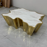 Table basse moderne de luxe en acier inoxydable, durable, avec plateau miroir irrégulier, pour hall d'hôtel et mobilier de projet de villa