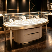Comptoir de présentation de bijoux de luxe moderne avec éclairage LED, cadre en métal doré, vitrine en verre et tiroir de rangement pour bijouterie, magasin de détail, centre commercial