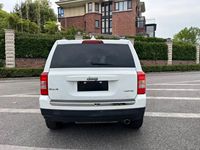 Jeep Patriot d'occasion 2013 2.4L 4x4 Édition Sport SUV Compact Noir 5 Places Personnalisation Intérieure Disponible