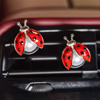 Diffuseur d'aromathérapie pour voiture, clip de parfum pour grille d'aération, en alliage, motif coccinelle sept étoiles tendance et mignonne, pour voiture électrique