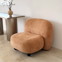 Fauteuil individuel moderne de luxe en tissu bouclé blanc pour salon, idéal comme accent de décoration