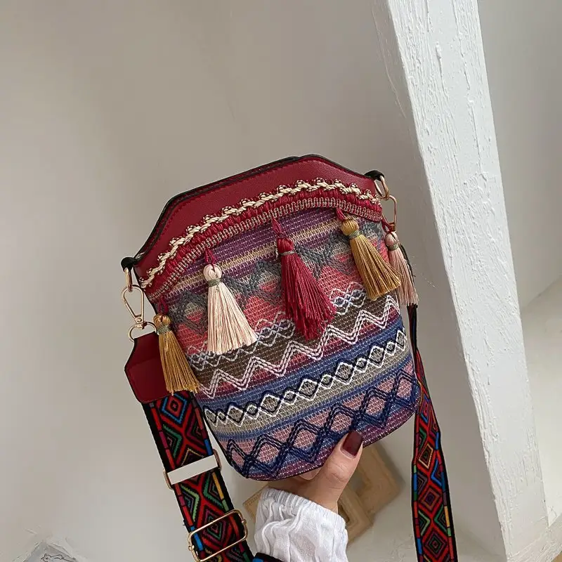 Fashion personalized Ethnic Style Hand Woven Shoulder Bag Tassel Pendant Sense Women Bucket Bag