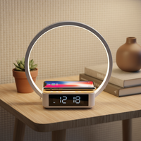 Mobiele telefoon aan het bed 10W Drie-in-één draadloze oplaadbeugel Aanraakdetectie Desktopdecoratie Wekker Moderne eenvoud