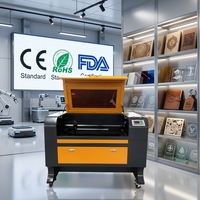 Machine de gravure et de découpe au laser CO2 ActionLasers 6090 pour acrylique et plastique - Haute précision, protection des yeux, refroidissement par eau