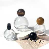 À vendre parfum de luxe atomiseur pompe de pulvérisation ronde de forme sphérique 30ml 50ml 100ml parfum bouteille en verre