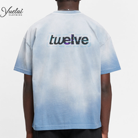 T-shirt homme en jersey de coton 280 g/m² épais, coupe ample, col ras du cou, épaules tombantes, style streetwear oversize, avec motif graphique et effet délavé