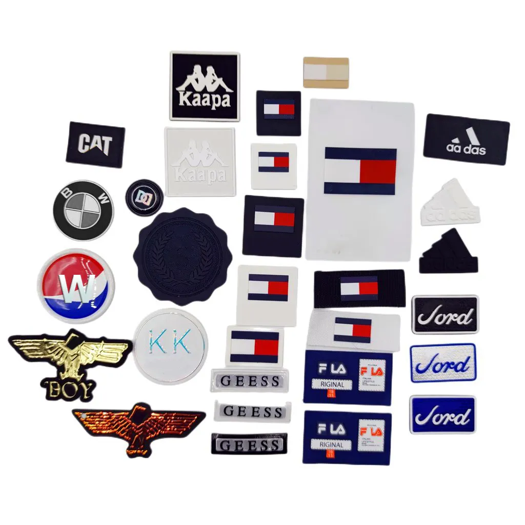 Etiquetas claras e luxuosas customizáveis da borracha do PVC, etiquetas de borracha para a roupa, emblemas do silicone