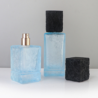 Flacon de parfum en verre bleu craquelé carré de luxe, design craquelé, 50 ml, 100 ml, avec bouchon texturé, pour l'emballage de parfums