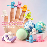 Bombes de bain aux huiles essentielles multicolores en boîte et boules de sels effervescents